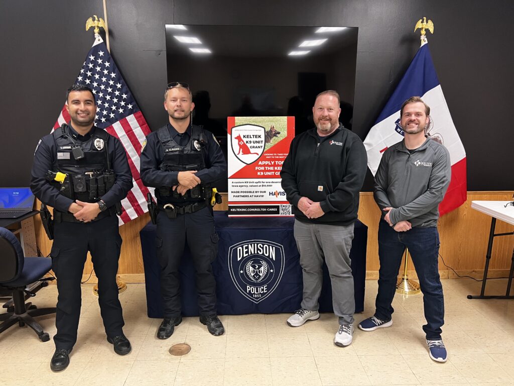 President of KELTEK, Larry Kolontar (center-right), is pictured with officers from the Denison, Iowa Police Department, and KELTEK Account Executive Andrew Ketcham (right) at the Denison PD Headquarters.